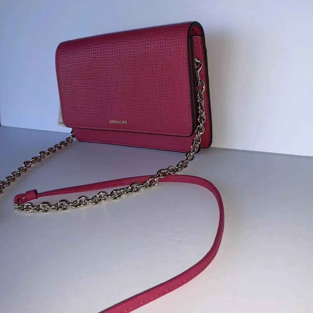 Coach details embossed